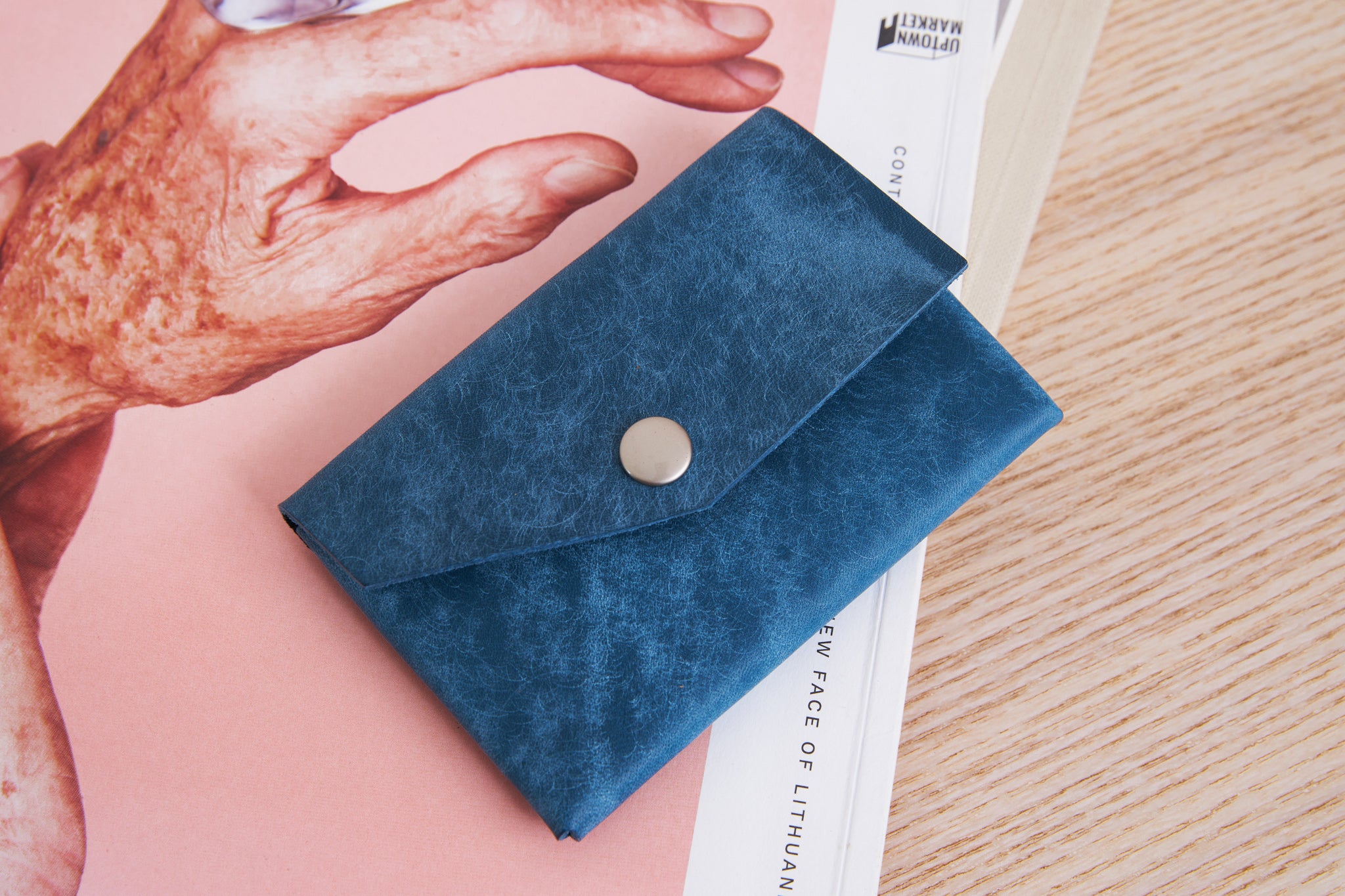 Small leather wallet for coins and cards made from full grain leather ocean blue color
