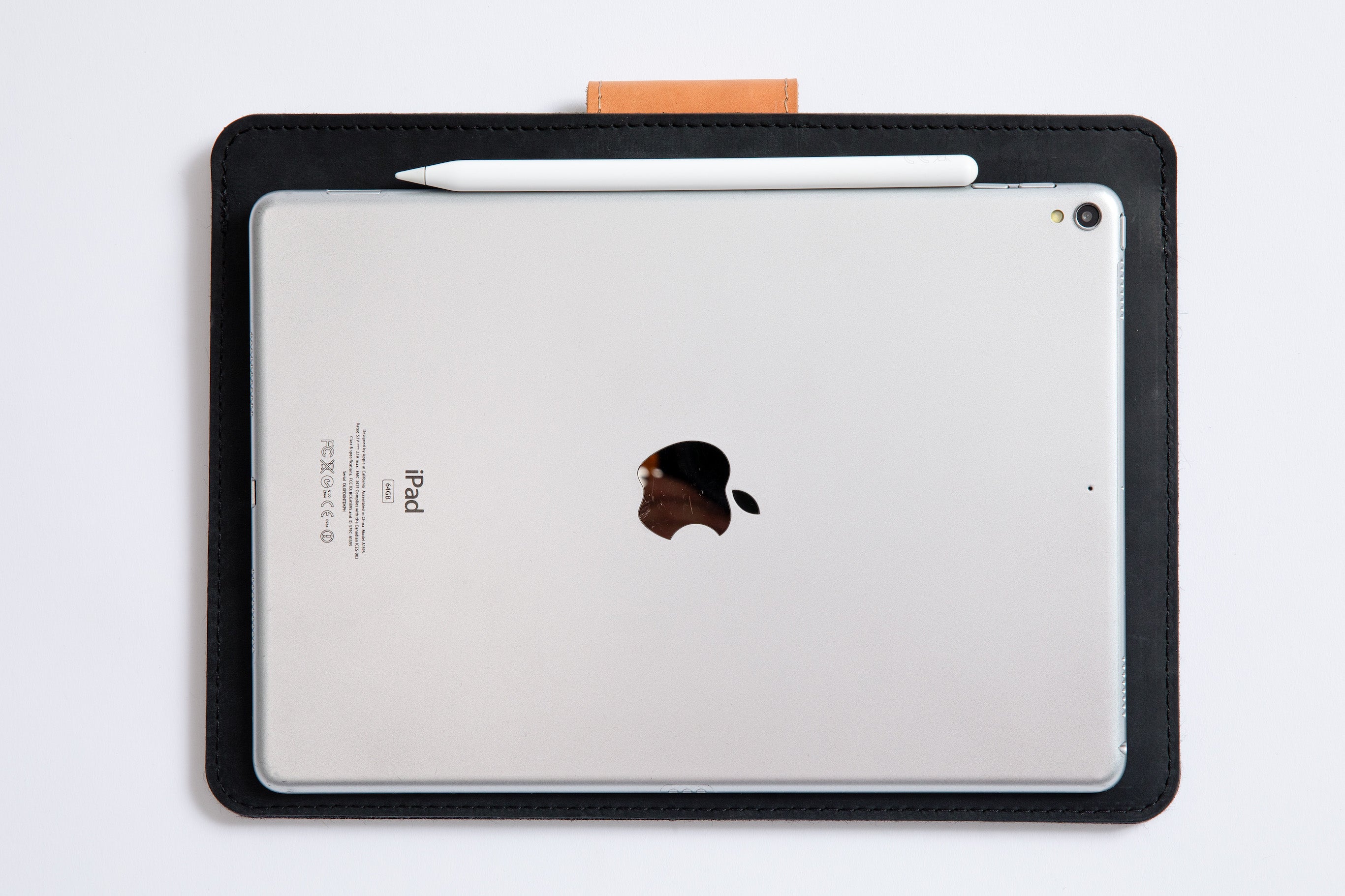 Luxury leather iPad case sleeve with Apple pencil holder.