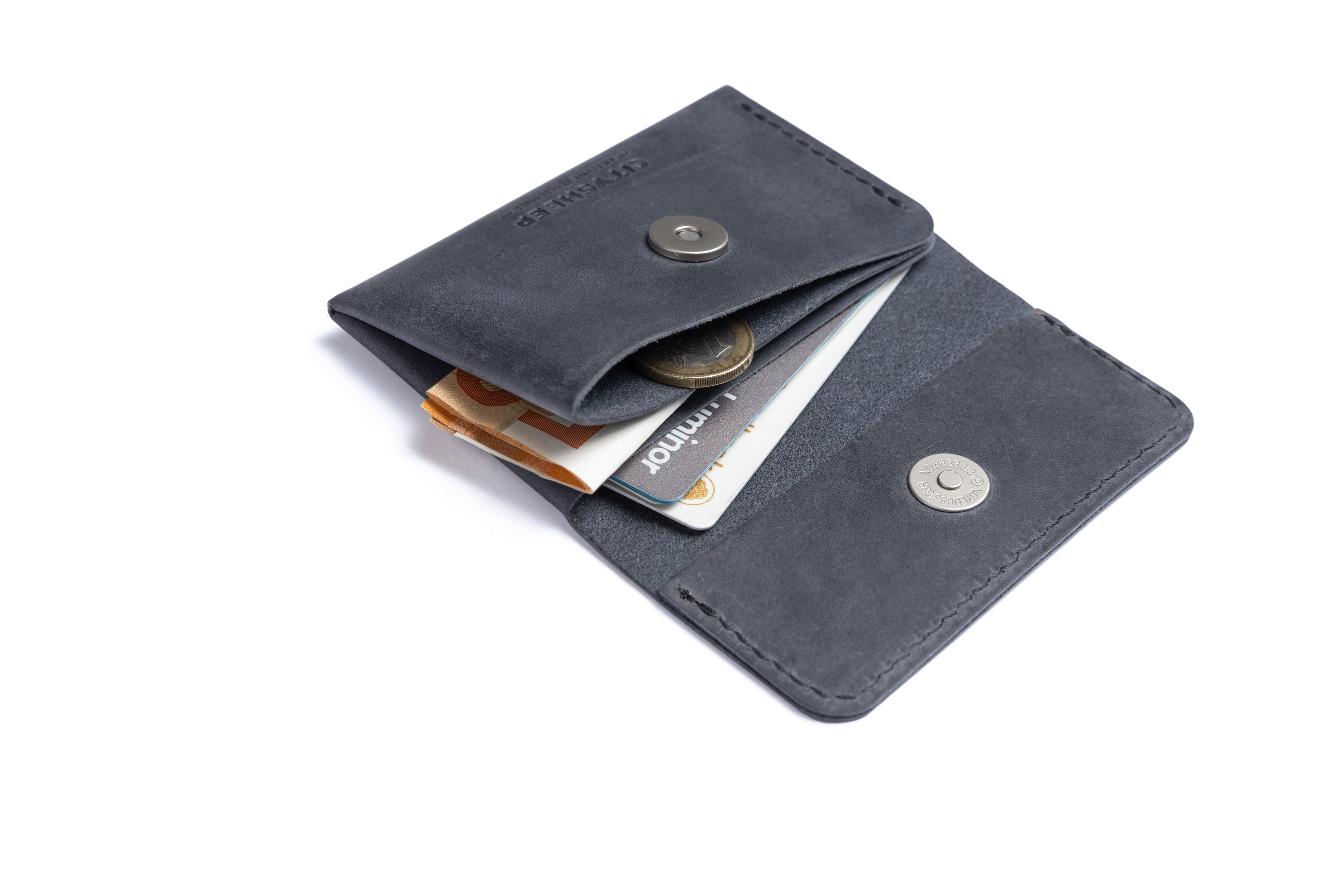 Minimalist grey leather wallet for men and women. Small, compact and functional.