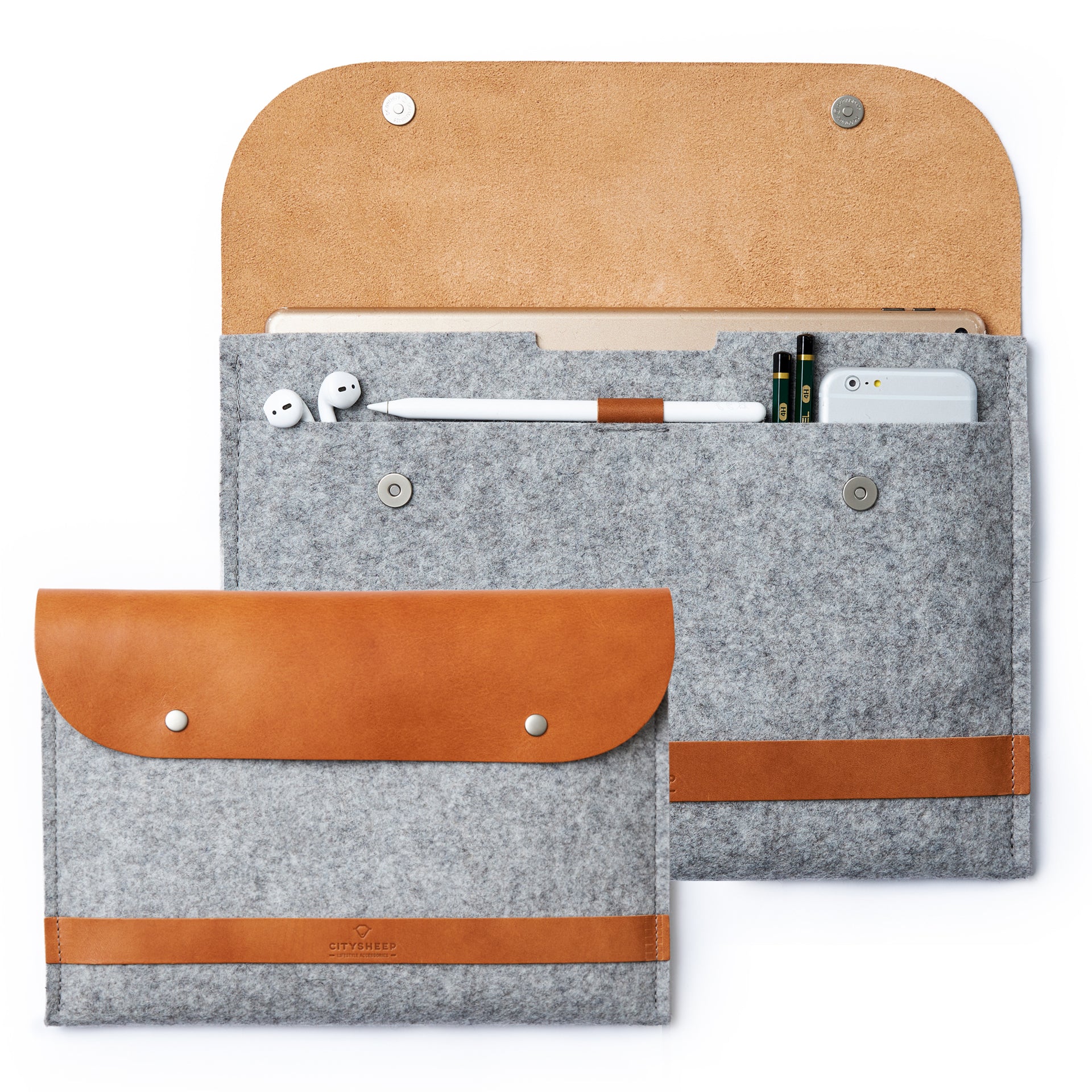 iPad carrying case crafted from Vegetable tanned leather and merino wool felt, fits iPad, accessories, Apple pencil.