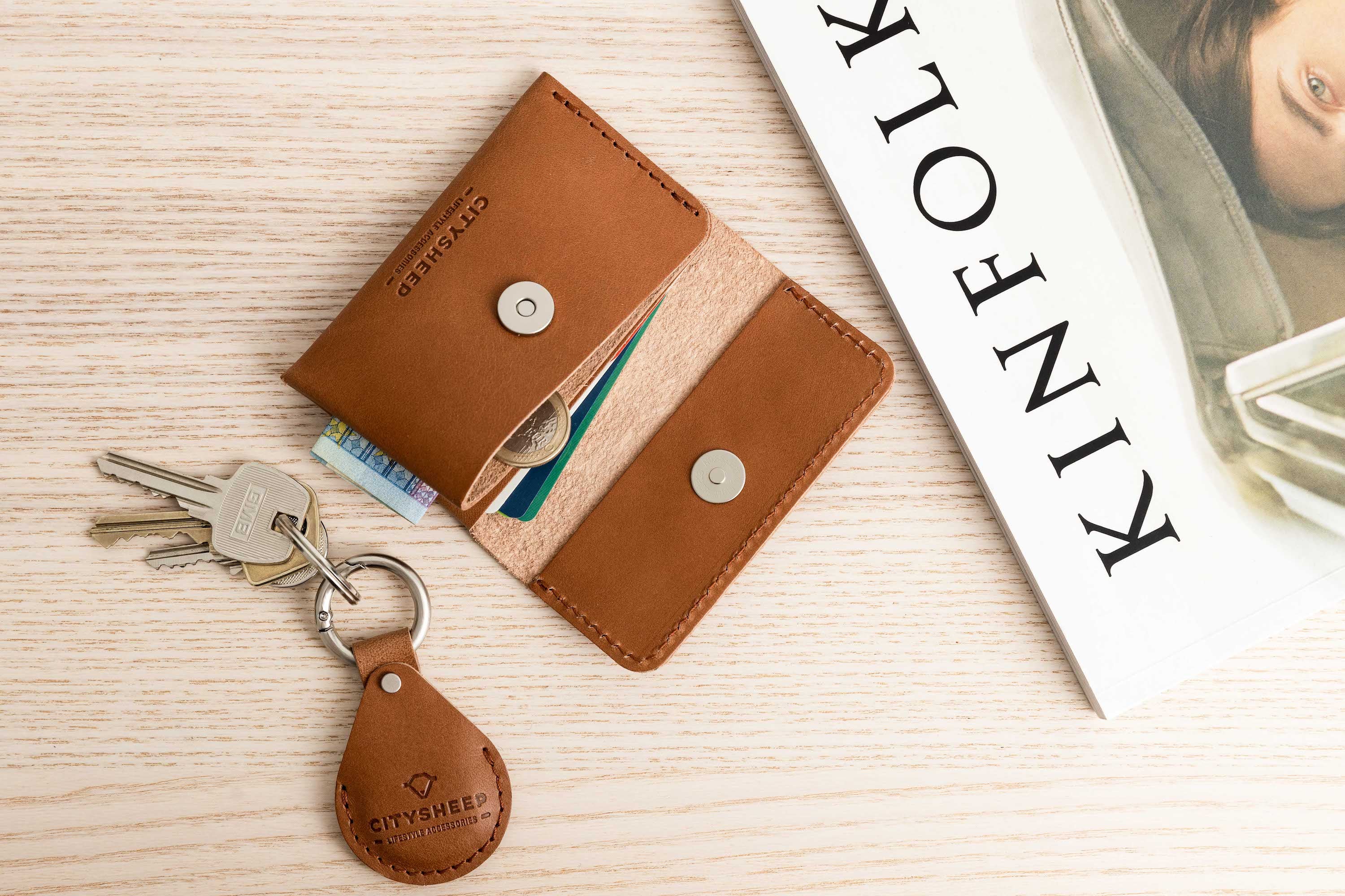 Leather AirTag keychain fully cover, protects AirTag from bumps and scratches.