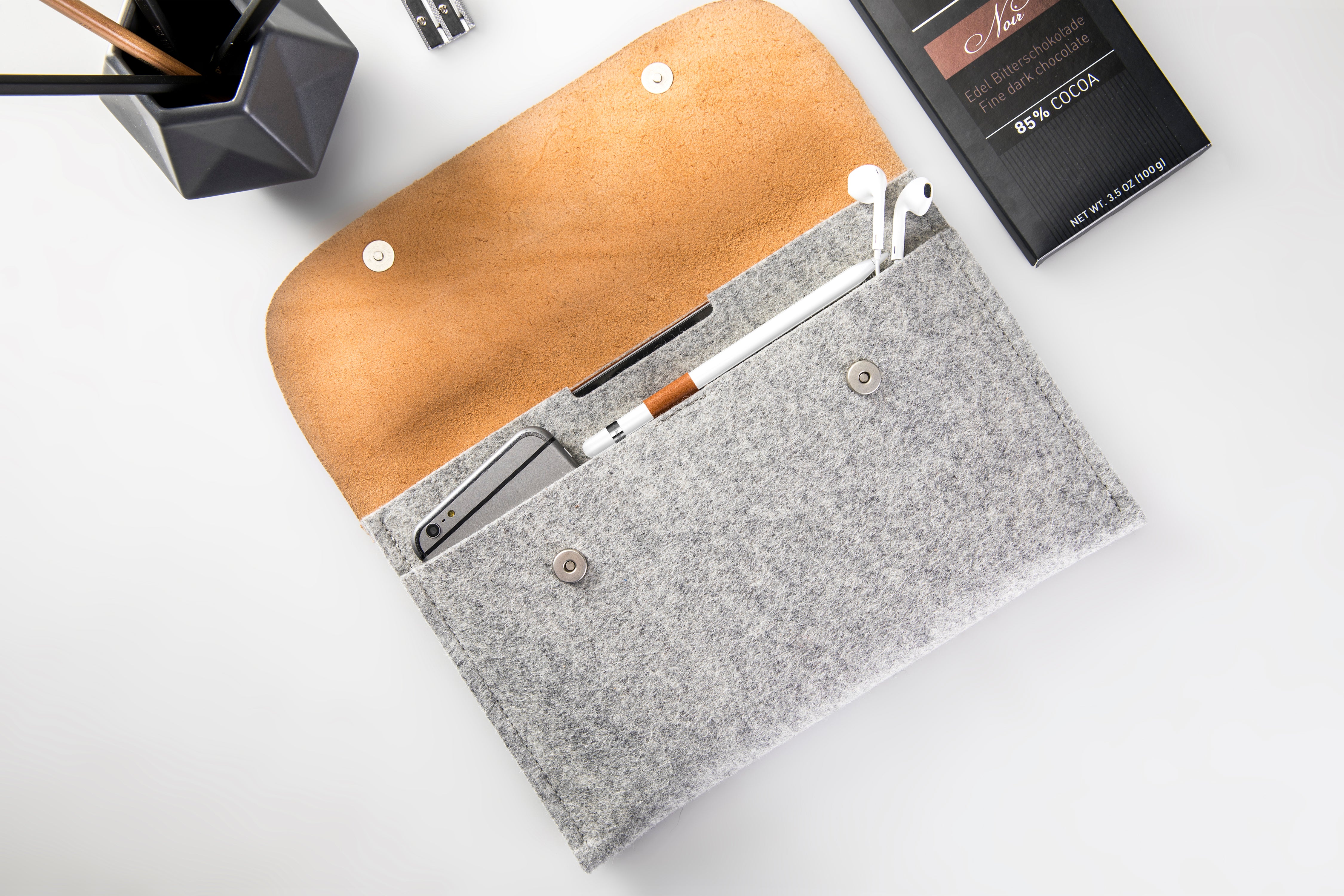 Handcrafted leather and wool felt Pad case sleeve with loop for Apple pencil and compartment for charger.