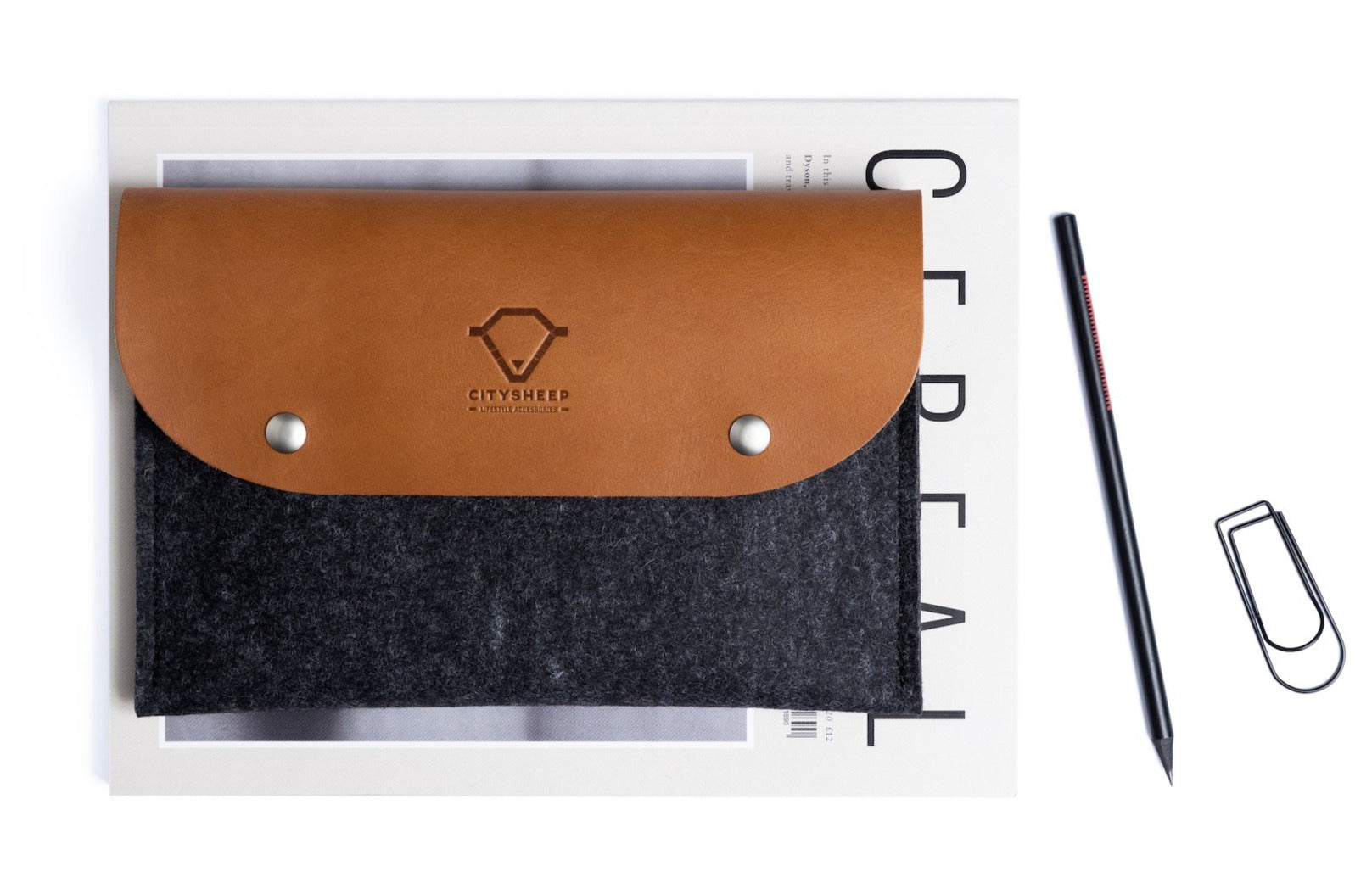 Premium Leather iPad case sleeve with flap closure and magnetic button.