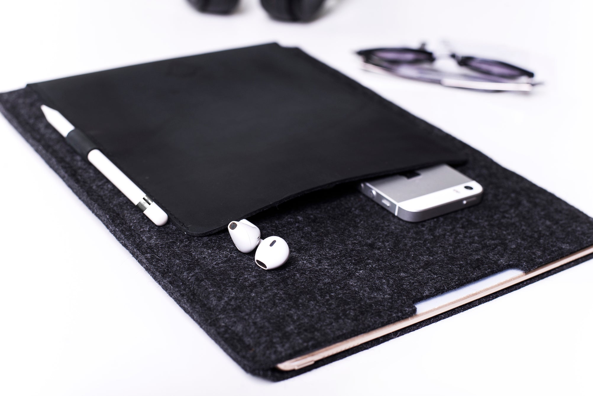 Slim protective iPad sleeve, made from pure wool felt and full grain crazy horse leather.