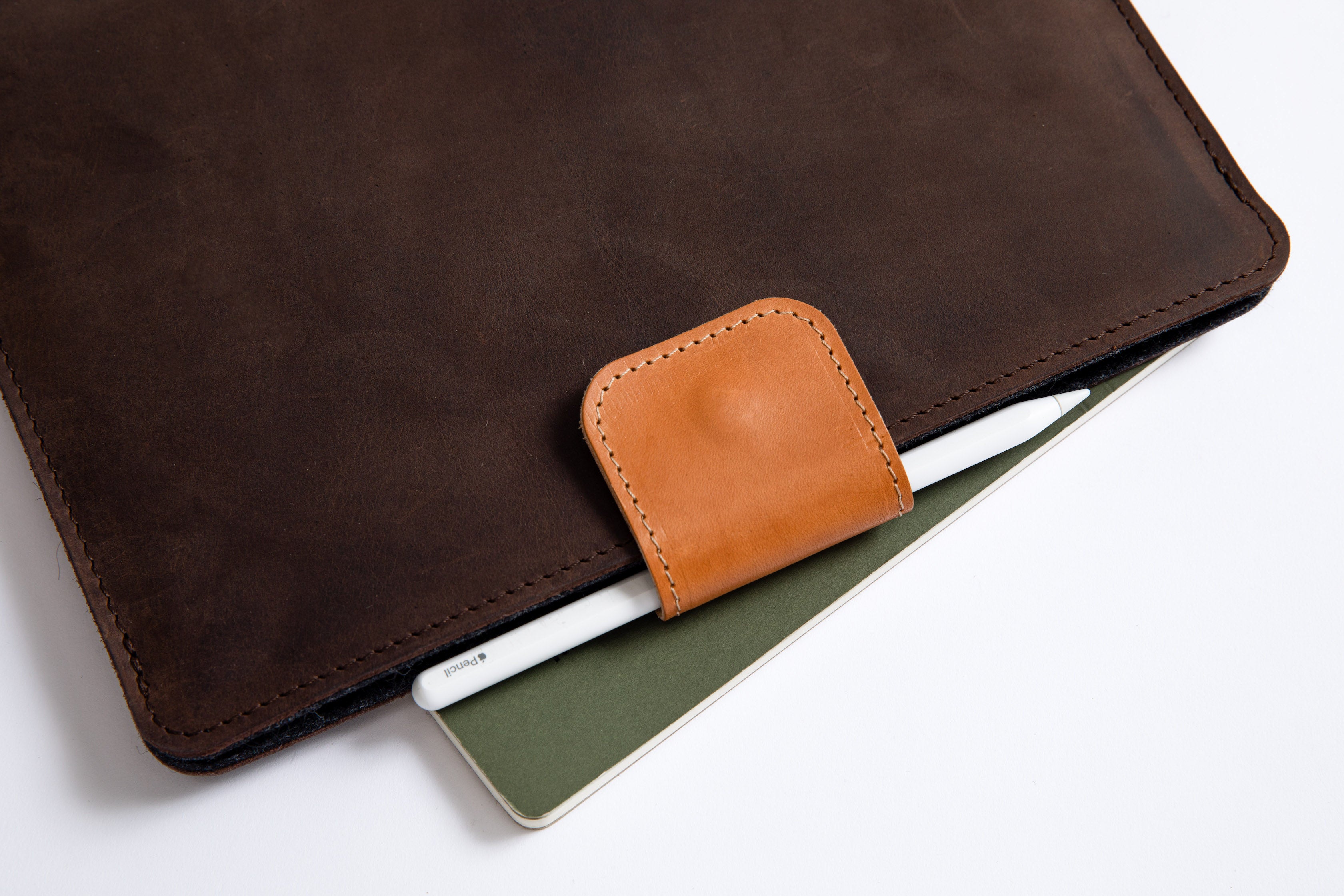 Crazy Horse leather case sleeve crafted in Europe. Beautifully age.