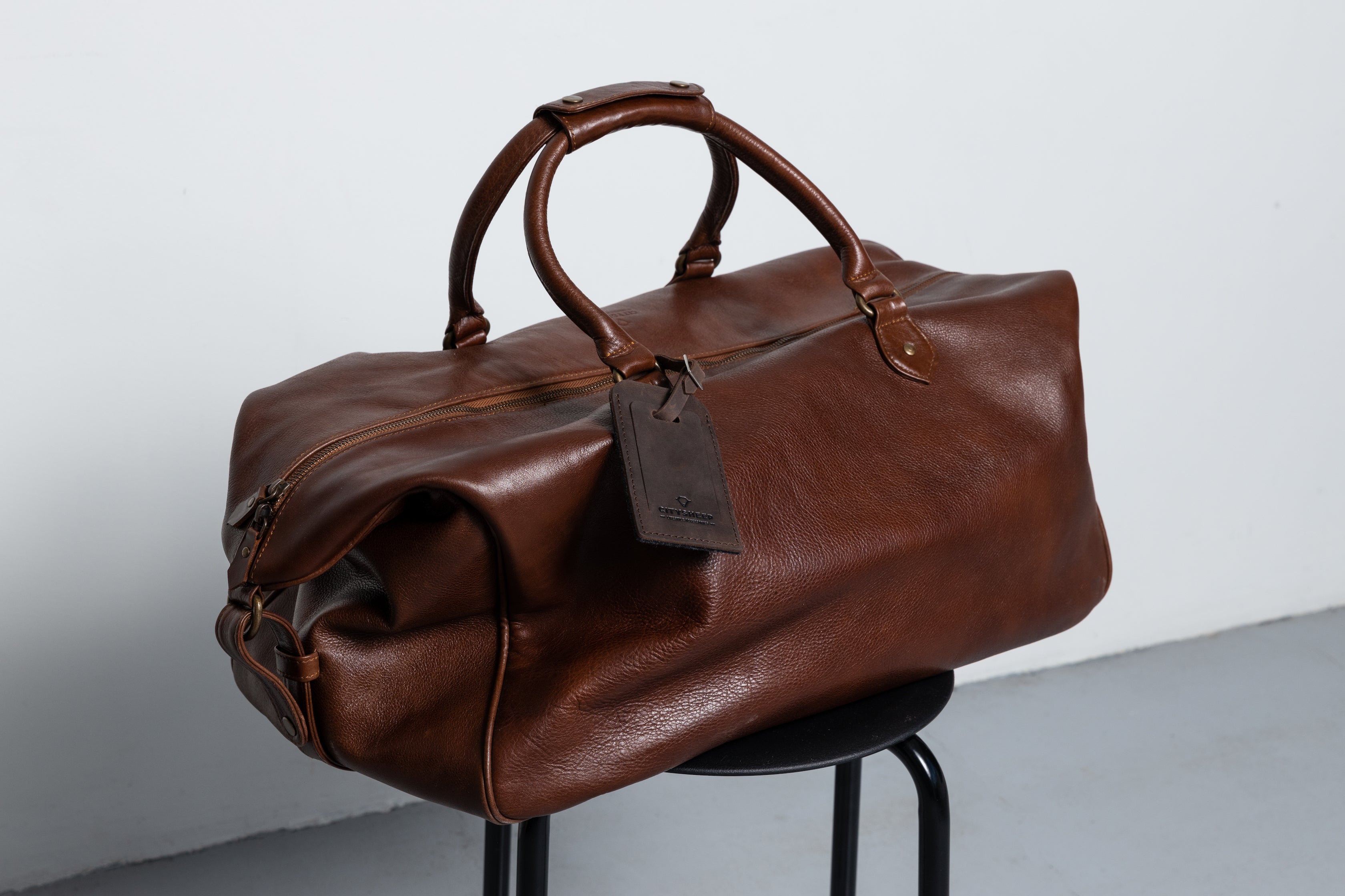 High quality full grain brown leather luggage tag.